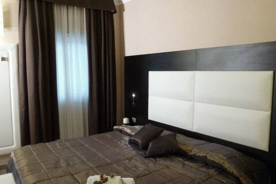 EH Suites Rome Airport Euro House Hotels hotel bedroom