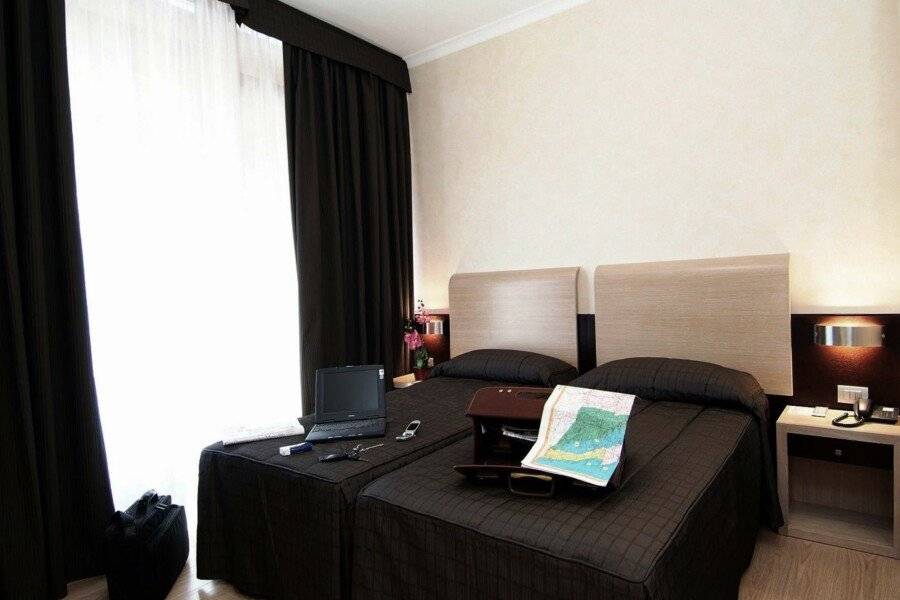 EH Suites Rome Airport Euro House Hotels hotel bedroom