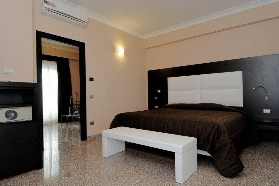 EH Suites Rome Airport Euro House Hotels hotel bedroom