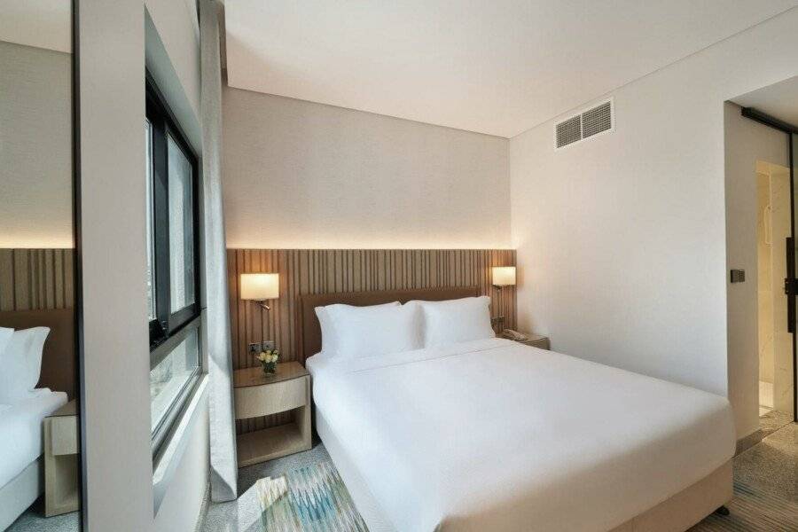 Arabian Park, an Edge by Rotana Hotel hotel bedroom