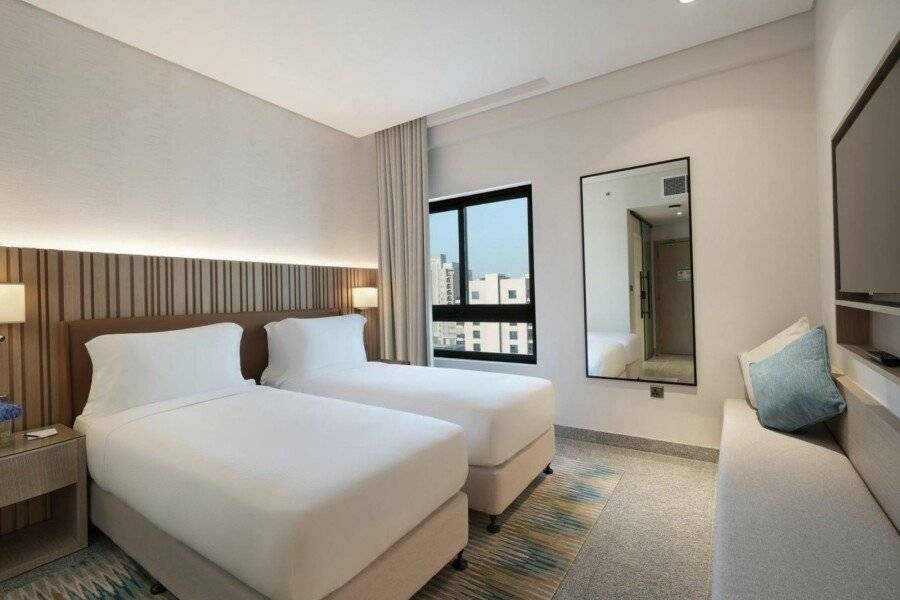 Arabian Park, an Edge by Rotana Hotel hotel bedroom