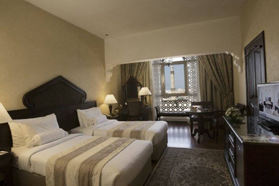 Arabian Courtyard Hotel & Spa hotel bedroom