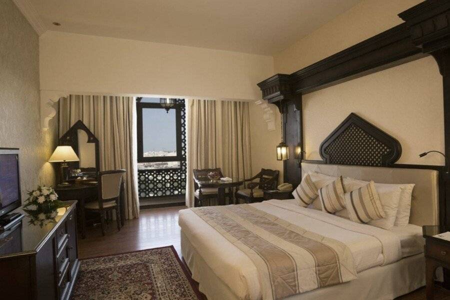 Arabian Courtyard Hotel & Spa hotel bedroom