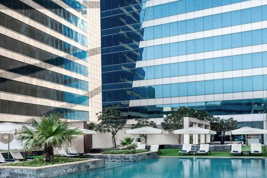 The H infinity pool, outdoor pool, hotel facade