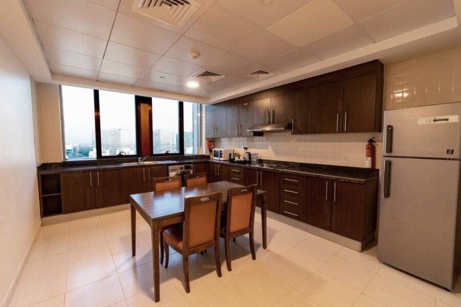 Abidos Hotel Apartment Land kitchen