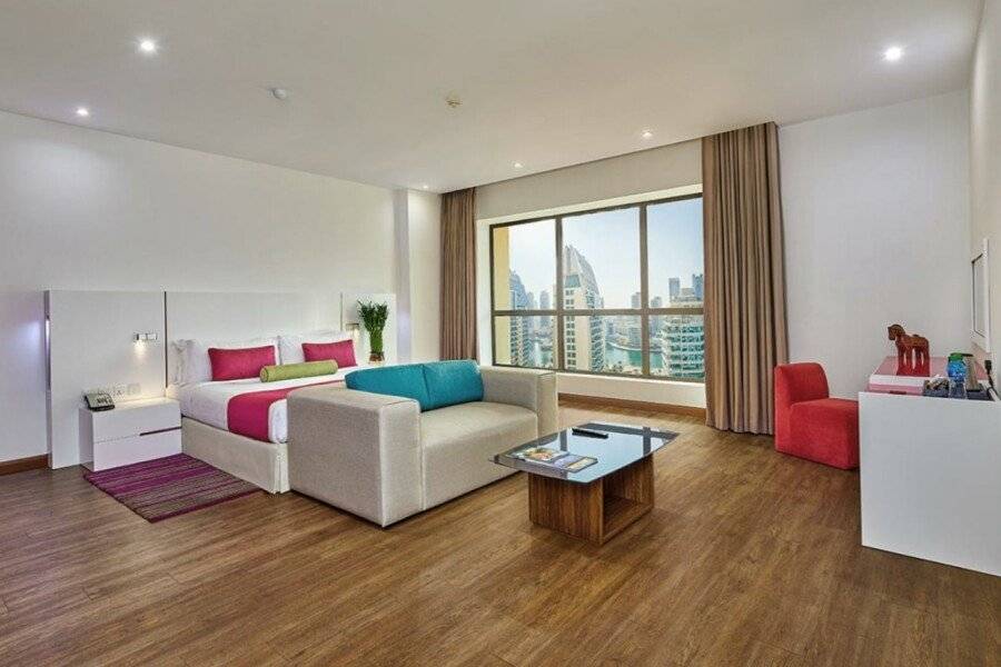 Ramada Hotel, Suites and Apartments by Wyndham JBR hotel bedroom