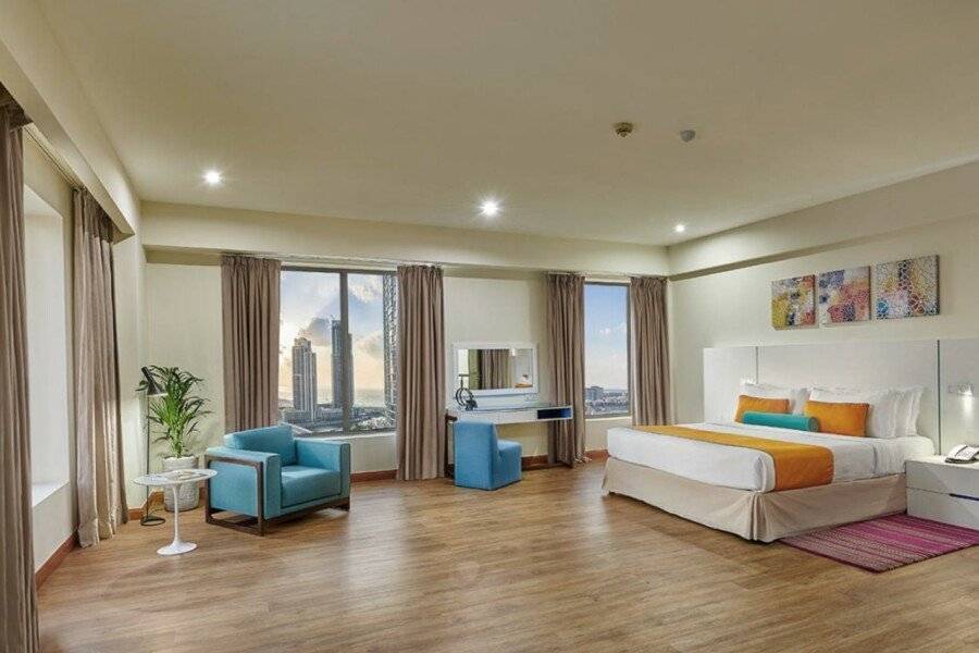 Ramada Hotel, Suites and Apartments by Wyndham JBR hotel bedroom