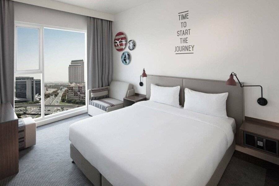 Rove Healthcare City - Bur hotel bedroom,city view