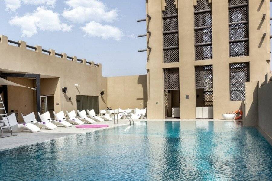 Premier Inn Al Jaddaf rooftop pool, outdoor pool, hotel facade