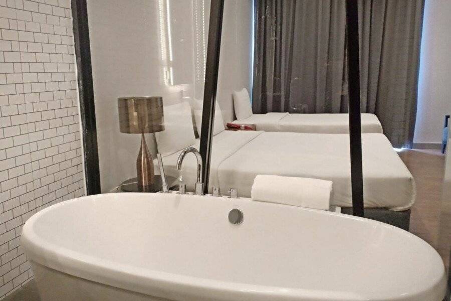 Vismaya Suvarnabhumi Hotel hotel bedroom,bathtub