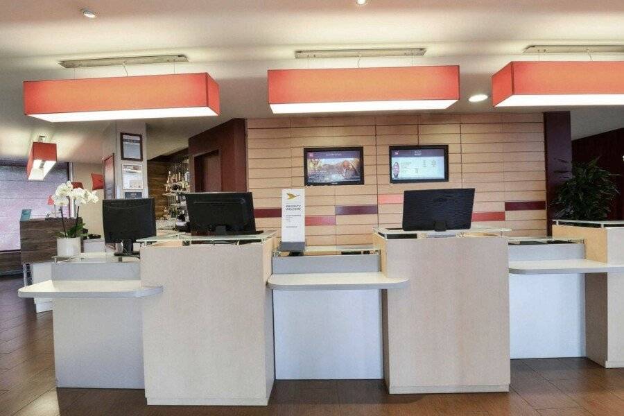 Ibis Citysouth front desk, lobby, 