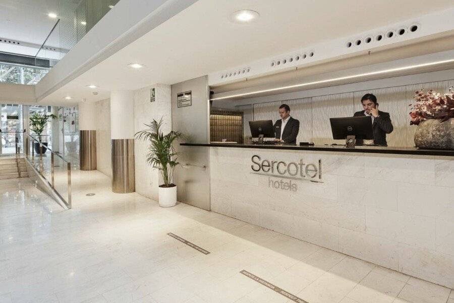 Sercotel Caspe lobby, front desk