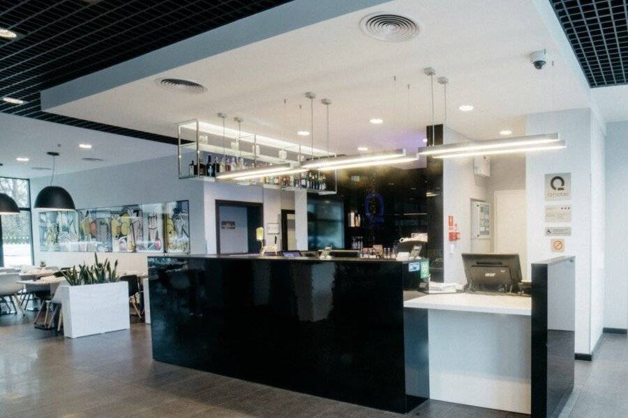 Q Hotel lobby, front desk, restaurant