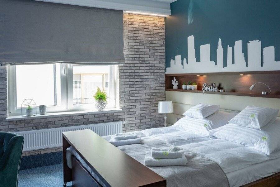 AGA Tenis Apartments by Radwańska hotel bedroom