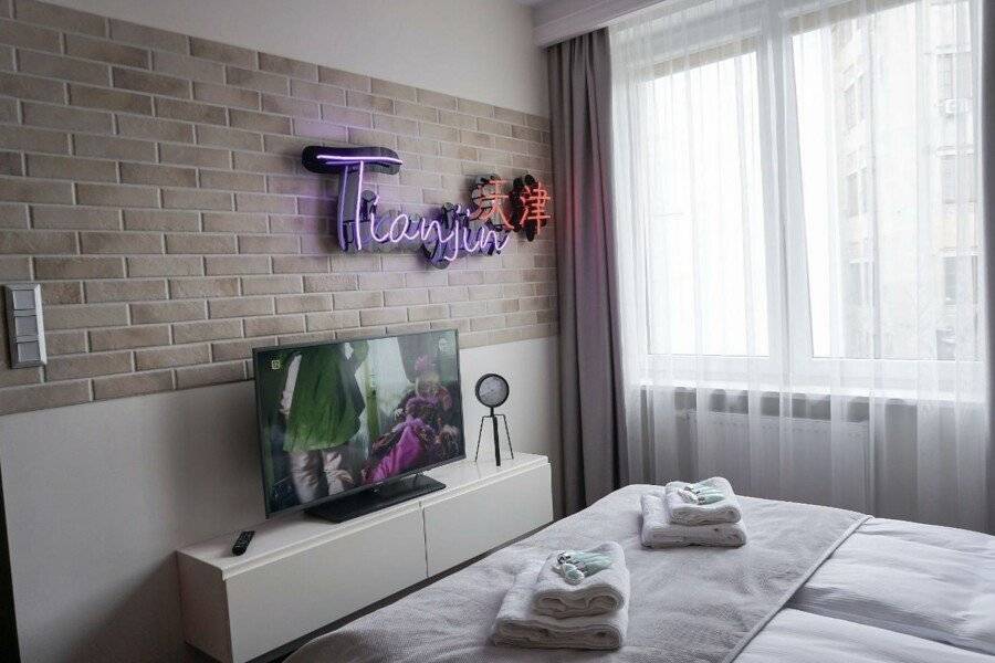 AGA Tenis Apartments by Radwańska hotel bedroom