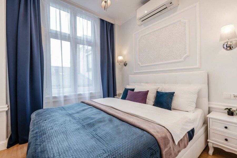 Main Square Apartments hotel bedroom