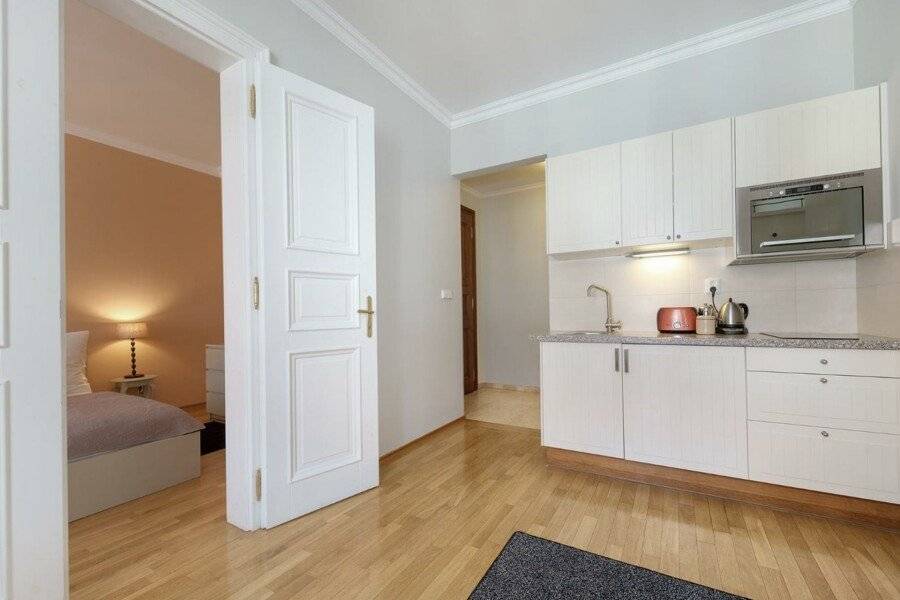 Hunger Wall Residence kitchen, hotel bedroom