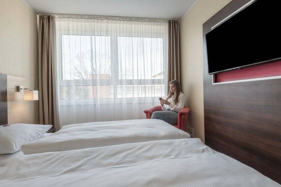 acom Hotel City Sued hotel bedroom