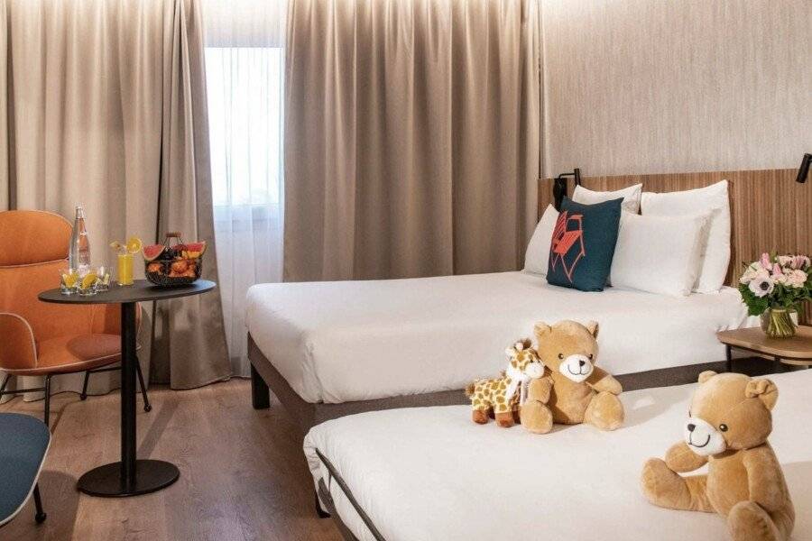 Novotel Arenas Aeroport hotel bedroom,kids club