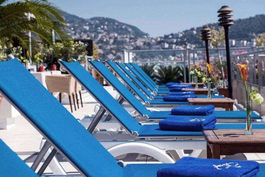 Hotel Aston La Scala rooftop pool, outdoor pool, lounge, ocean view