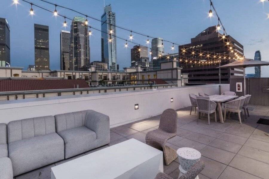 Modern Apartment Rentals rooftop pool, outdoor pool, lounge, city view