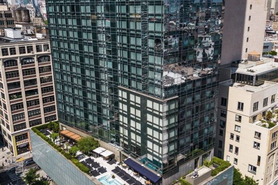 The Dominick Hotel facade, rooftop pool