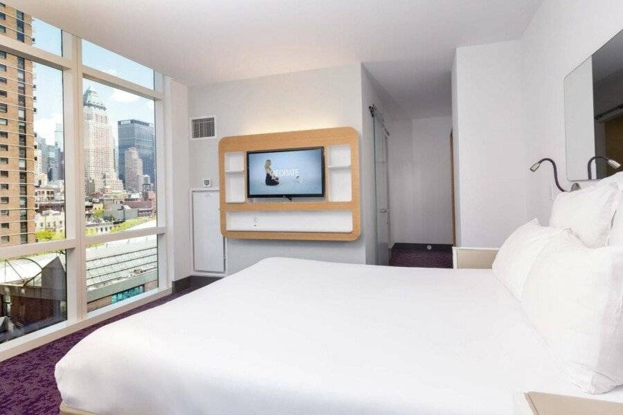 YOTEL Times Square hotel bedroom,city view