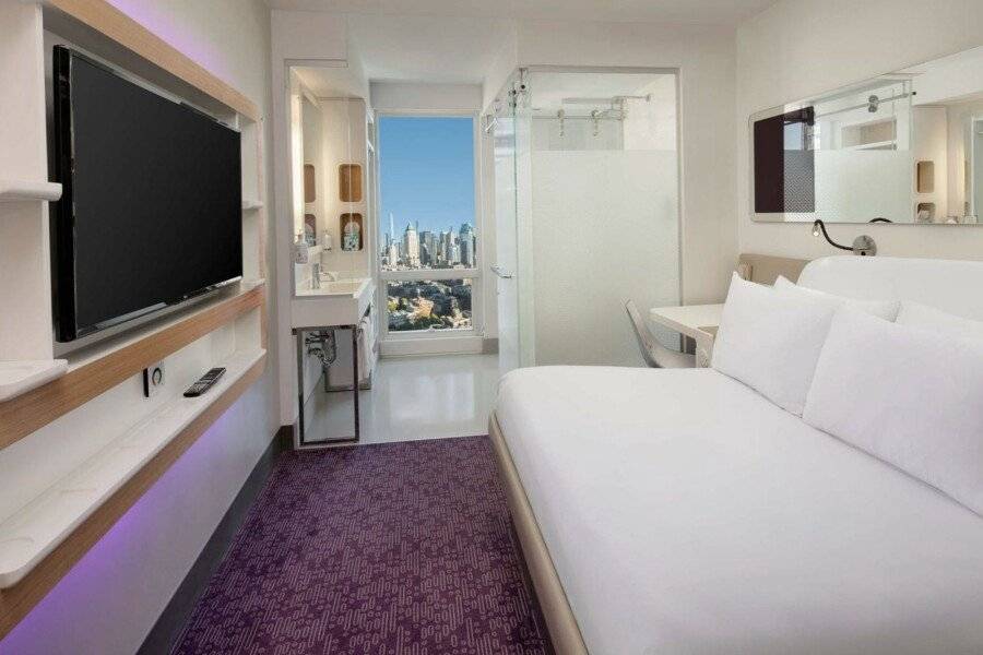 YOTEL Times Square hotel bedroom,city view