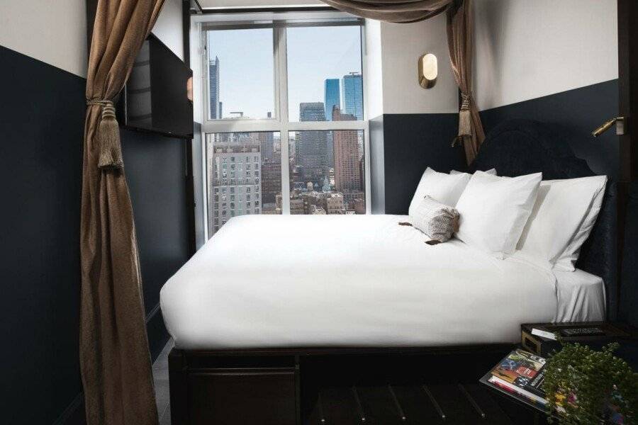 CIVILIAN Hotel hotel bedroom,city view