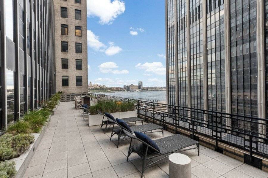 Placemakr Wall Street facade, balcony, ocean view