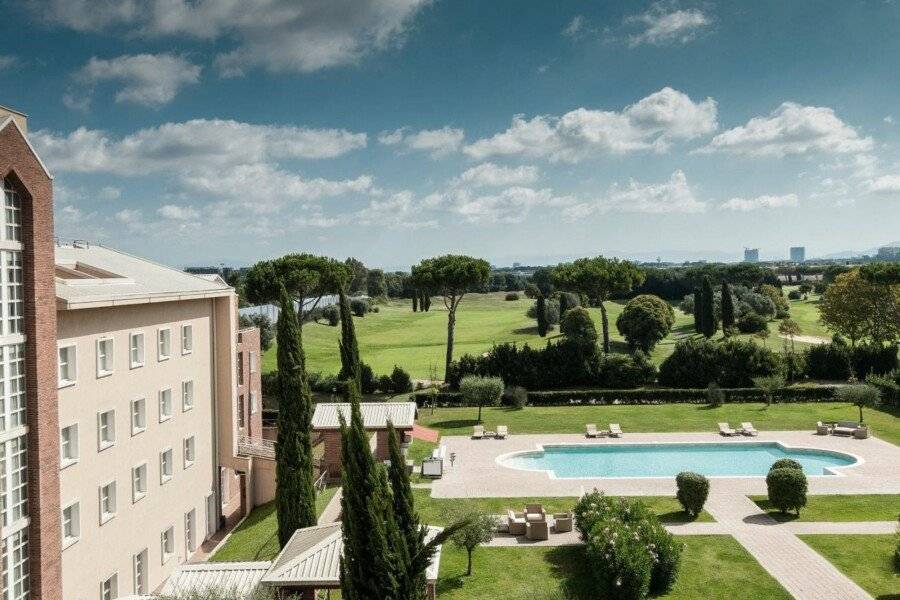 Sheraton Parco de Medici hotel facade,outdoor pool,garden,ocean view