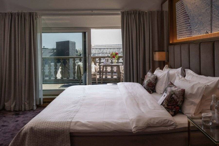 Bank Hotel, a Member of Small Luxury Hotels hotel bedroom, balcony