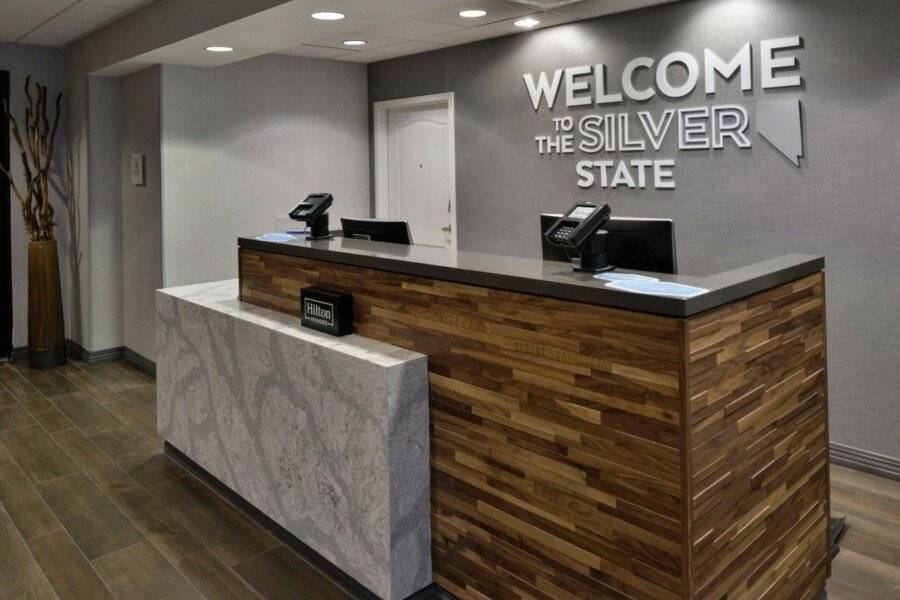 Hampton Inn & Suites Airport front desk, lobby, 