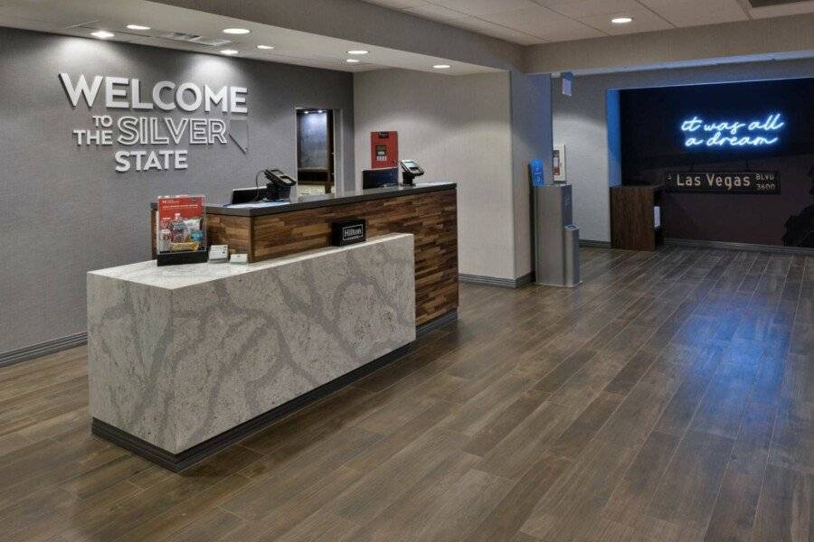 Hampton Inn & Suites Airport front desk, lobby, 