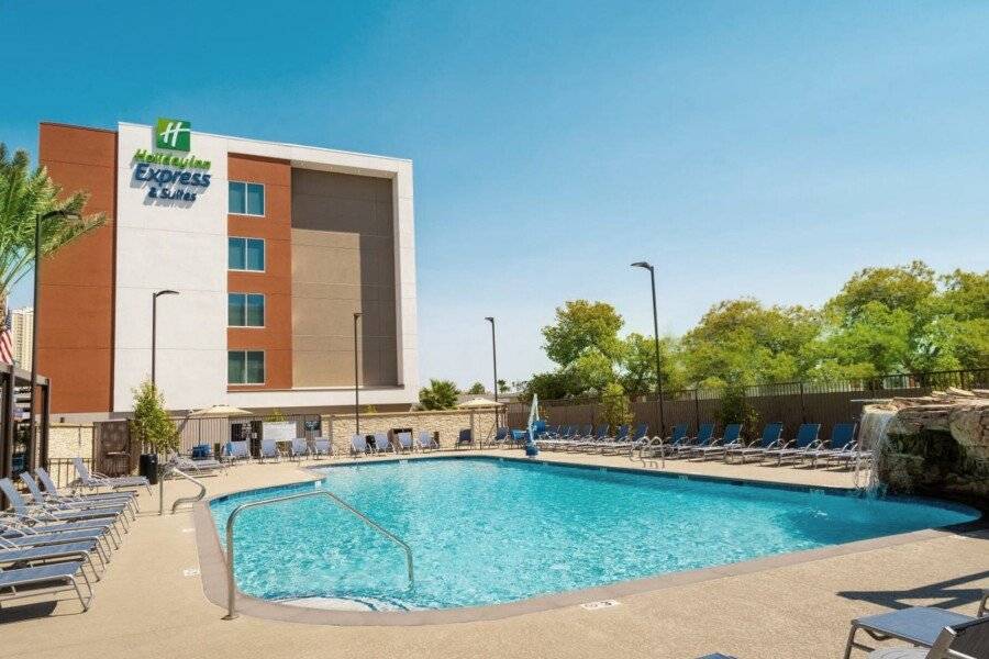 Holiday Inn Express & Suites - - E Tropicana, an IHG Hotel outdoor pool,hotel facade