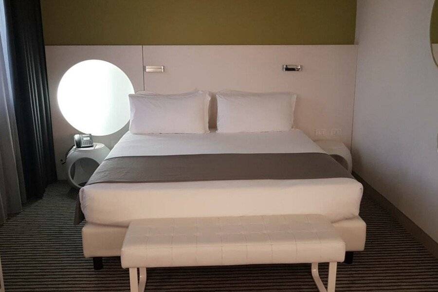 The Caesar Roma hotel bedroom