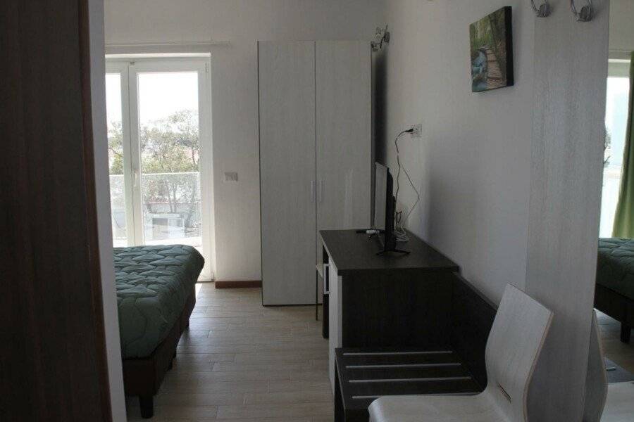 EKOTEL hotel bedroom