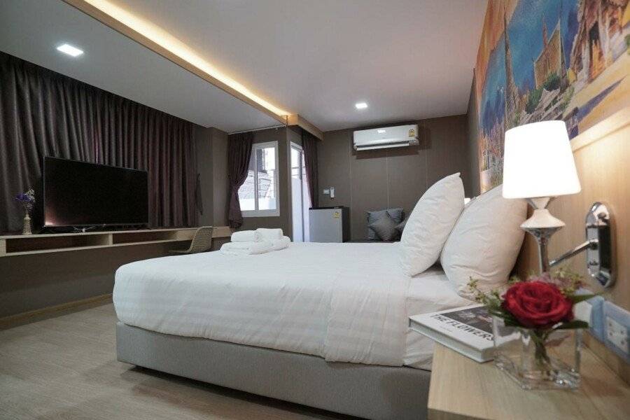 The Qube fifty Hotel hotel bedroom