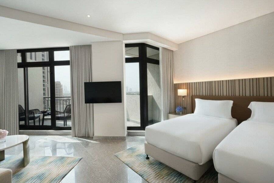 Arabian Park, an Edge by Rotana Hotel hotel bedroom,balcony