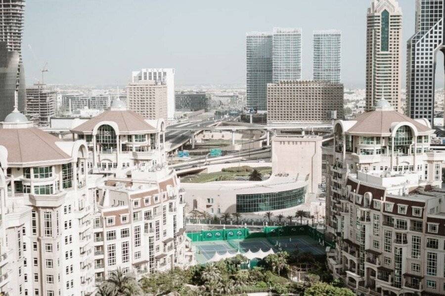 Swissôtel Al Murooj facade,outdoor pool,garden