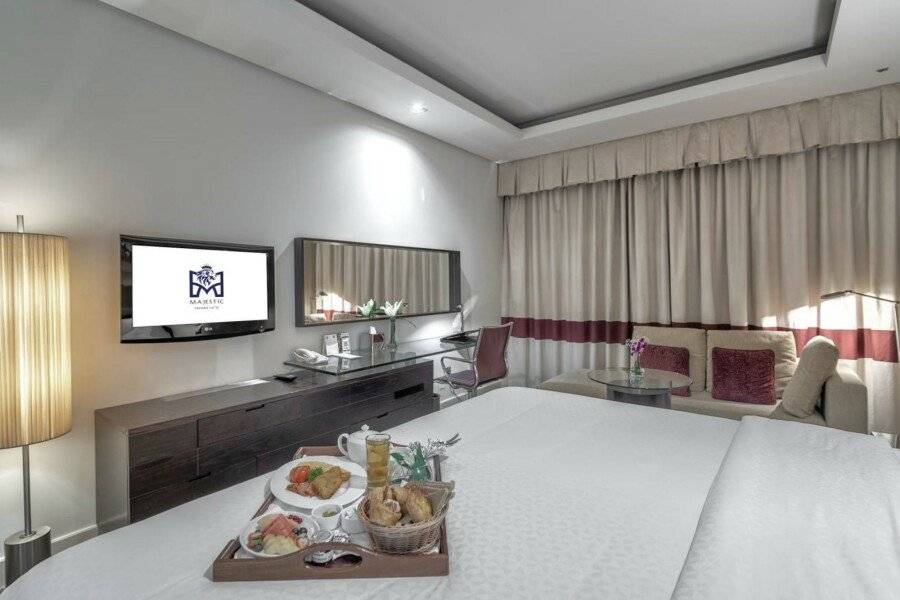 Majestic Premier Hotel Burdubai hotel bedroom,breakfast