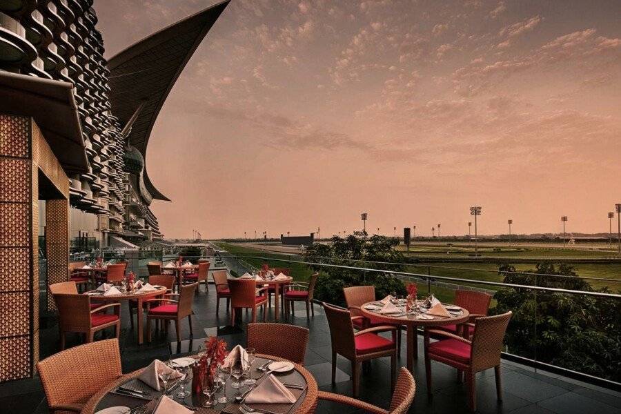 The Meydan Hotel facade, restaurant, outdoor pool