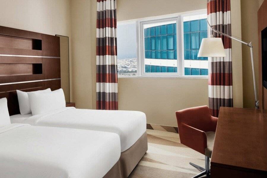 Novotel Al Barsha hotel bedroom