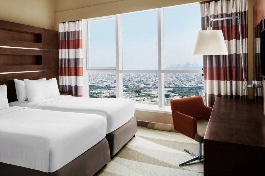 Novotel Al Barsha hotel bedroom,city view