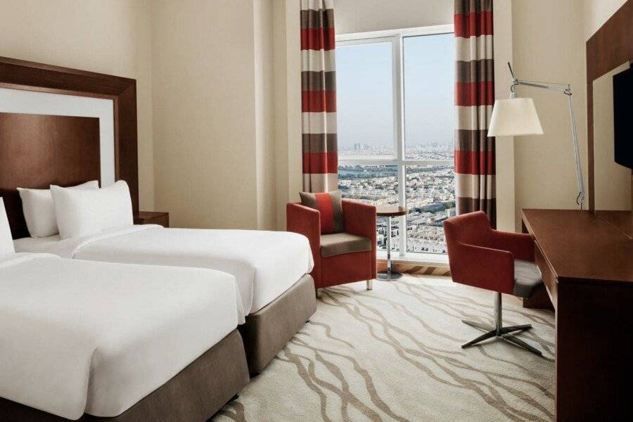 Novotel Al Barsha hotel bedroom,city view