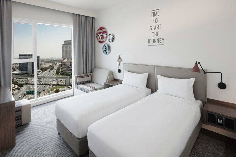 Rove Healthcare City - Bur hotel bedroom,city view