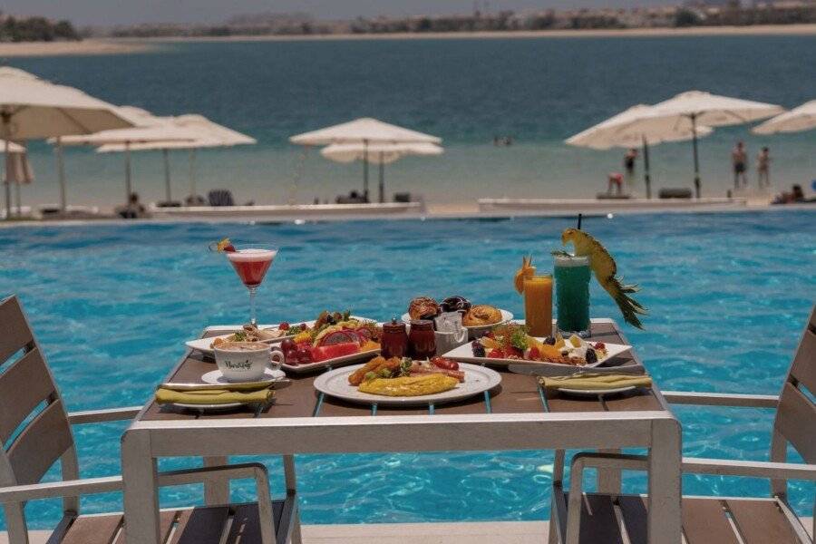 Royal Central Hotel and Resort The Palm outdoor pool,restaurant,bar,ocean view