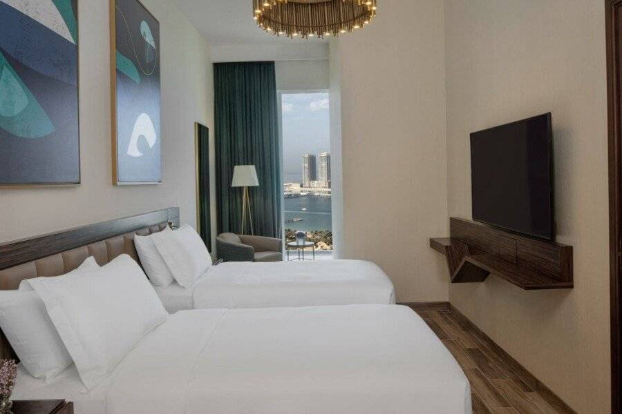 Avani Plus Palm View Dubai Hotel & Suites hotel bedroom,ocean view