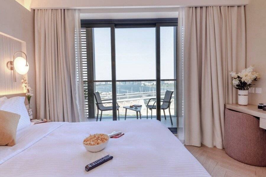 Citadines Culture Village, Waterfront Jadaf hotel bedroom,balcony,ocean view