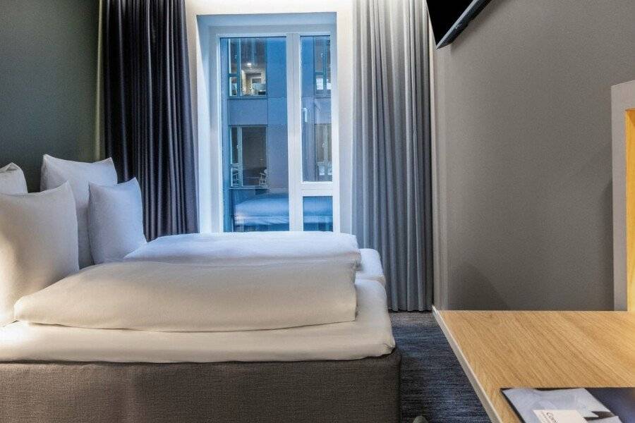 Comwell Copenhagen Portside Dolce by Wyndham hotel bedroom